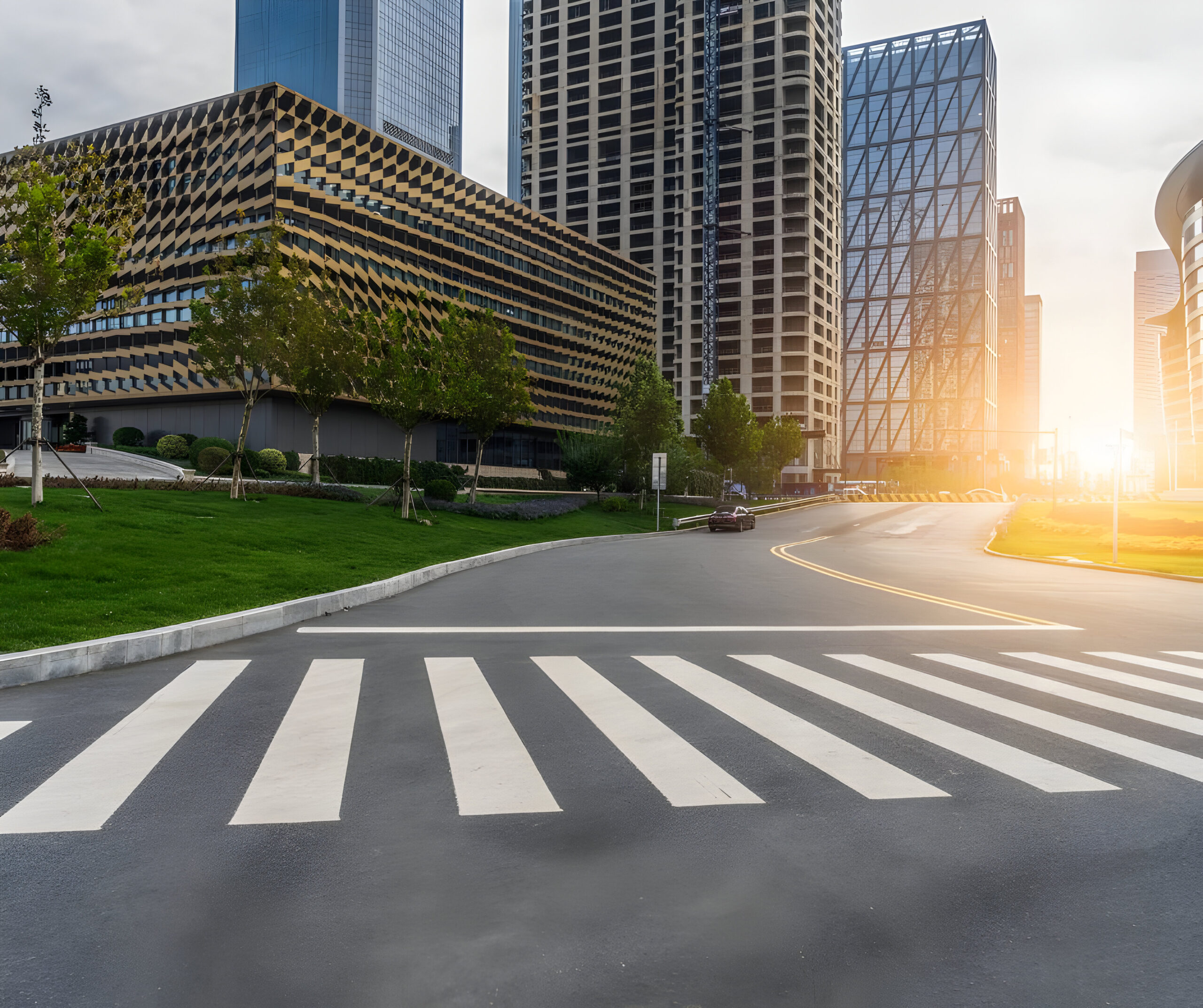 Street intersection with city buildings in the background